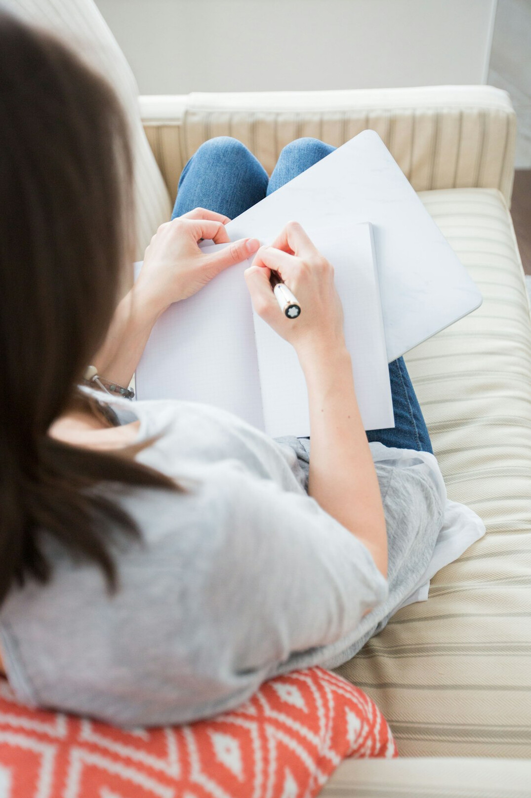 woman writing in journal