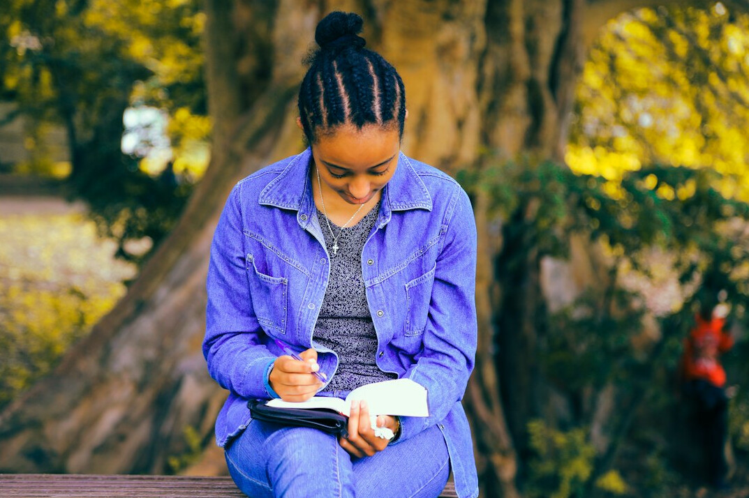 woman writing notes