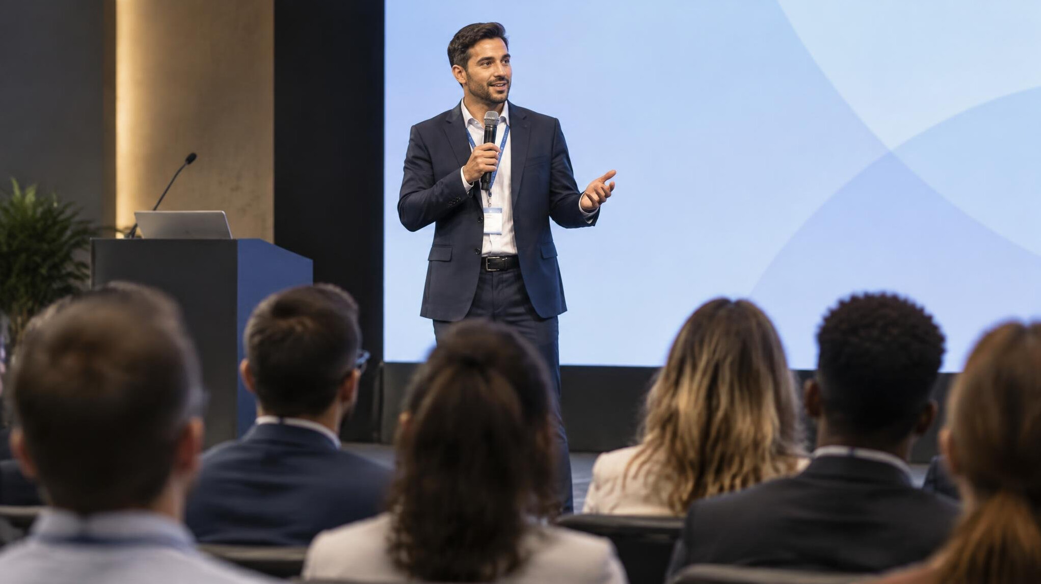 person speaking at conference